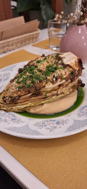 Roasted cabbage on bean hummus at Barbarella PLANT Bistro in Ljubljana