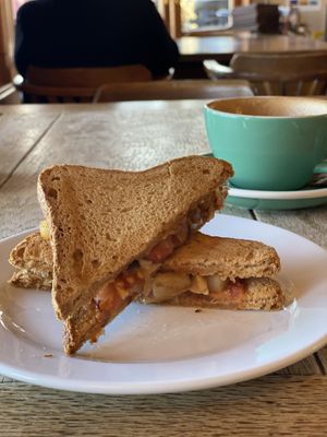 Vegan & gluten free toastie with tomato, onion, pineapple and mushrooms .  at Cafe Nevé in Fox Glacier