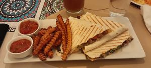 Quesadillas with fries at Ojas Plant Based in Sault Ste Marie