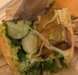 "Bahn Mi" a salty tofu and sweet pickle sandwich without pickled Daikon radish, carrots or toasted bread. Not Bahn Mi. at THE MARKET By ROOTED in Walnut Creek