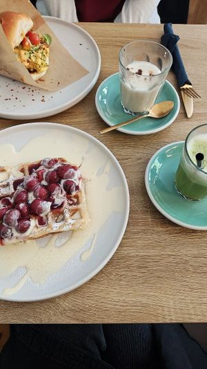 Waffle and "egg"drop, chai latte and matcha at Vegan Backyard in Berlin