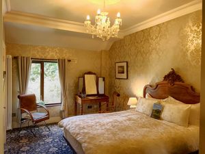 Garden bedroom - with King Size bed - just 10 metres to the side of Ghan House - mountain views & not a road or car park in site! at Ghan House in Carlingford