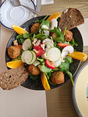 Falafel salad bowl (omg those strawberries!) at Santé in Mallorca