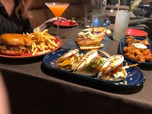 Pulled pork sandwich, cauliflower bites, cocktails, bao buns, charcuterie board at Nova Terra Kitchen & Creamery in Sebastopol