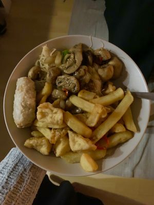Salt & pepper chips, tofu & mushrooms; veggie rice noodles & veggie spring rolls (all vegan & GF)  at Sweet Mandarin in Manchester