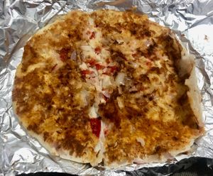 Onion tomato uthappam at Sangeetha Vegetarian Restaurant in Abu Dhabi