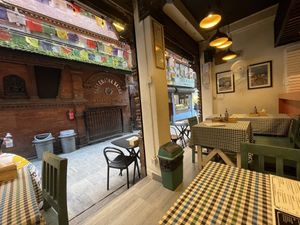 Inside the restaurant. There’s probably about 7 tables all up.   at Vera Pizza in Kathmandu
