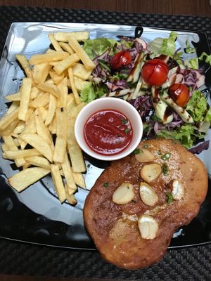 Fried seitan steak with chips from the main a la carte menu at Makro Vega in Split