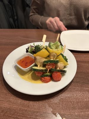Veg skewers with sweet chilli sauce.  at Mona's  in Weymouth