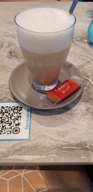 vegan Chai Latte with oat milk. The cookie is also vegan.  at Creperie Lamara in Hannover