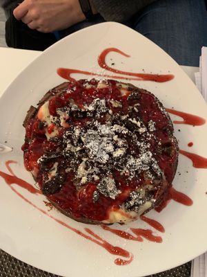 Chocolatewaffle with hot raspberries, oreos and vanilla pudding at Creperie Lamara in Hannover
