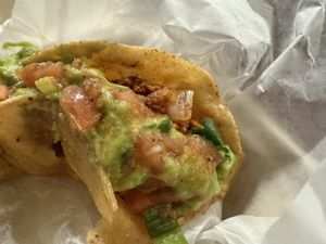 Plenty of faux meat under the generous amount of guac  at OAK - Cancun - T1  in Oakland