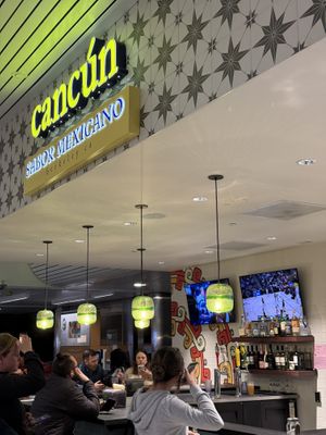 Bar area and sign  at OAK - Cancun - T1  in Oakland