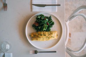 our vegan French omelette, is served with kale salad. this dish belongs to our winter menu. nowadays instead of it we serve a fermented buckwheat wrap with grilled vegs & tofu  at Pino and Bugorn - Maybe closed in Izmir