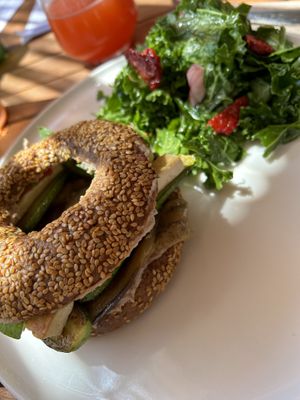 Hummus and veggies filled bagel served with kale  at Pino and Bugorn - Maybe closed in Izmir