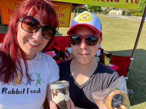 Serving cake cups and chipwiches at the Music in the Park series at Trailblazer Park at Rabbit Food Vegan Snack Cart in Travelers Rest