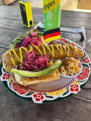 Bratwurst on bun  at Kham Dee in Chiang Mai