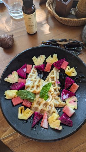 Waffles with syrup and fruit at Villas Bukit Lipah in Karangasem