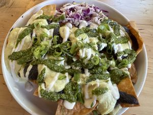 Cosmic Queso: cashew dip with fried organic corn tortillas & pepita chimichurri.  at The Wild Poppy Cafe & Market in Sebastopol