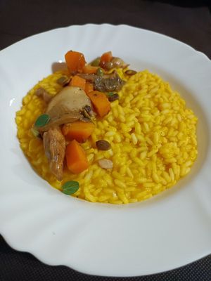 Risotto con crema di zucca, cubetti di zucca e porcini at Il Picchio Rosso in Bergamo
