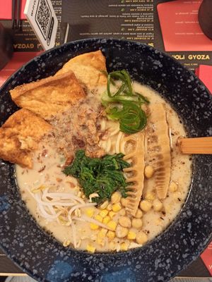 Vegan ramen with fried tofu, chickpeas, marinated bamboo, spinach, bean sprouts, spring onion, corn and fried onion at Naruto Ramen - Noodles Bar Restaurant in La Spezia