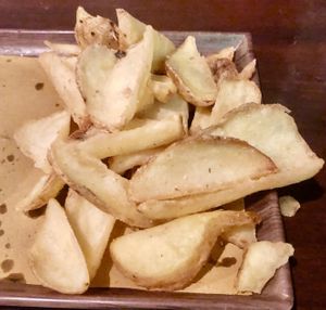 Potato dippers  at Black Fire Pub in Bologna