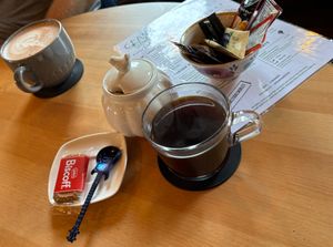 Guitar shaped teaspoon and an americano plus hot chocolate. at Crank Cafe @ Crank Studios in Morley