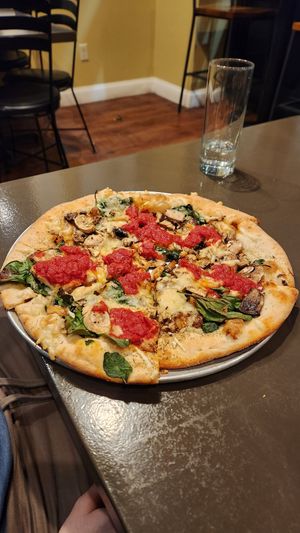 Fresh mushrooms, vegan cheese and spinach at OTTO in Exeter