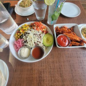 Spicy Avocado Salad & Sweet Potato Fries at The Daily Kitchen & Bar in Richmond