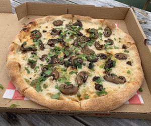 Miso mushroom - house white miso sauce, vegan cheese, soy glazed mushrooms, sesame seeds, chili garlic crunch, green onion, cilantro at Pizzeria Don Luca in Wilmington