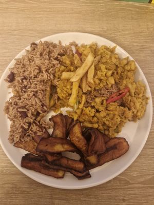 Takeaway: chickpea curry, rice & peas, fries with a side of fried plantain at Jerk Junction Wilmslow in Wilmslow