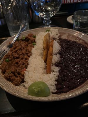 Veggie beef, beans, coconut rice, plantains at Cafe La Trova in Miami