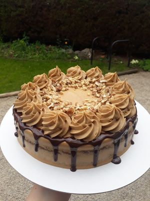 Coffee and walnut cake with dark chocolate drip, available to order. at The Spotless Leopard - Food Van in Bristol