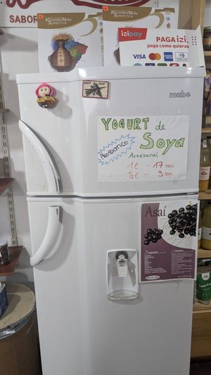 Fridge with fresh homemade tofu and soya yogurt at NaturLandia in Cusco