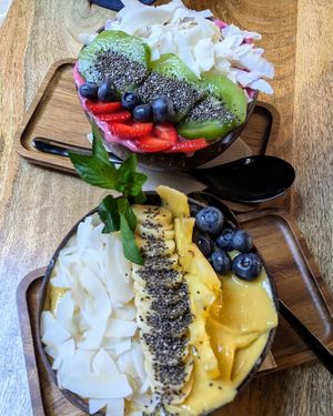 Sunshine and Pink Dragon Smoothie Bowls at PLANT SHACK - Cala Mayor in Mallorca