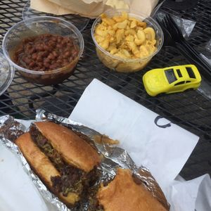 Sitting outside with beans, mac n cheez & V steak  at Drop Squad Kitchen in Wilmington