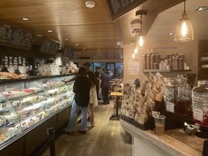 Inside, with indoor and outdoor seating in the back  at Mia's Brooklyn Bakery in Brooklyn