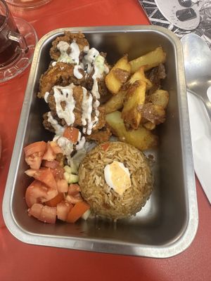 Mostrito- fried mushroom, fried potatoes, and rice   at Ongo in Porto