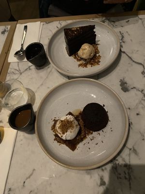 Chocolate ganache layer cake, rum coconut sticky toffeee  at Mildreds - Victoria in South West London