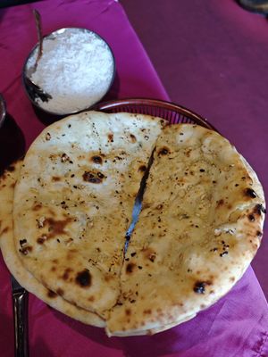 Garlic naan and free rice at Indian Royal  in Liege