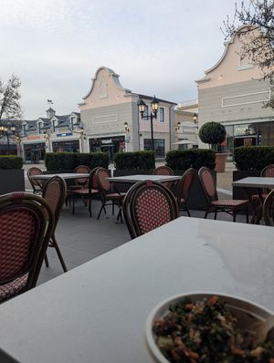 Outdoor seating at YVR - Hula Poke - Domestic Terminal in Richmond