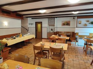 Interior ready for Brunch guests with child corner at Hotel Restaurant du Cerf in Soubey