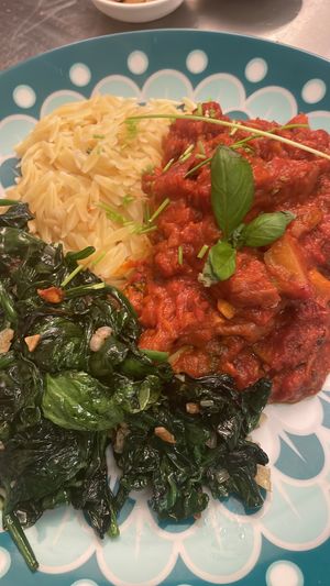 Italian Orso accompanied with a richly filled vegan pastasaus and garlic spinach at CHALAZA in Valkenburg