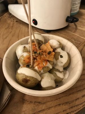 Patatas con salsa kimchi. Buenísimas!   at Quinoa in Barcelona