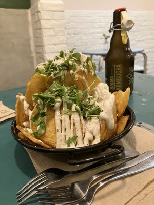 Patatas fritas con salsa trufada  at Quinoa in Barcelona