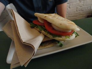 Vegan sandwich tomato-smoked mozarella at Quinoa in Barcelona
