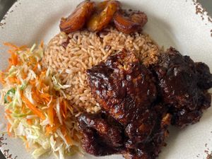 Jerk BBQ Fry Chick'n

Crispy, golden-fried Oyster Mushrooms, glazed with our signature homemade BBQ Jerk sauce for a bold kick. Served with a side of authentic rice & Peas at Di Vegan Yaad Kitchen in Hollywood