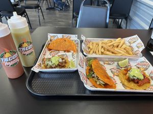 Birria tacos, carne Asada taco, Al pastor taco, fries, red & green taco sauce  at Tacos Veganos II Avondale   in Avondale