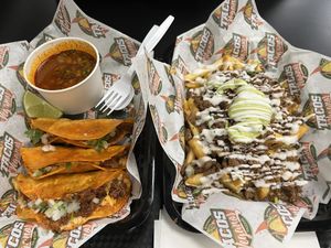 Birria tacos and loaded fries  at Tacos Veganos II Avondale   in Avondale