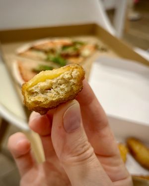 Delivered vegan nuggets  at PizzOria in Premia De Mar